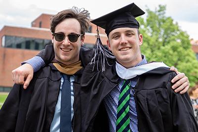 Two students at Commencement